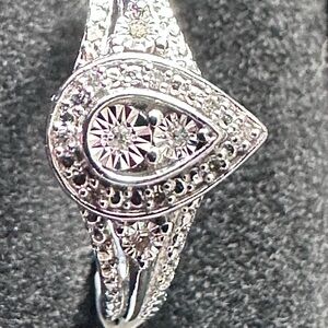 Natural Diamonds 
925 Sterling Silver
Ring Size 7